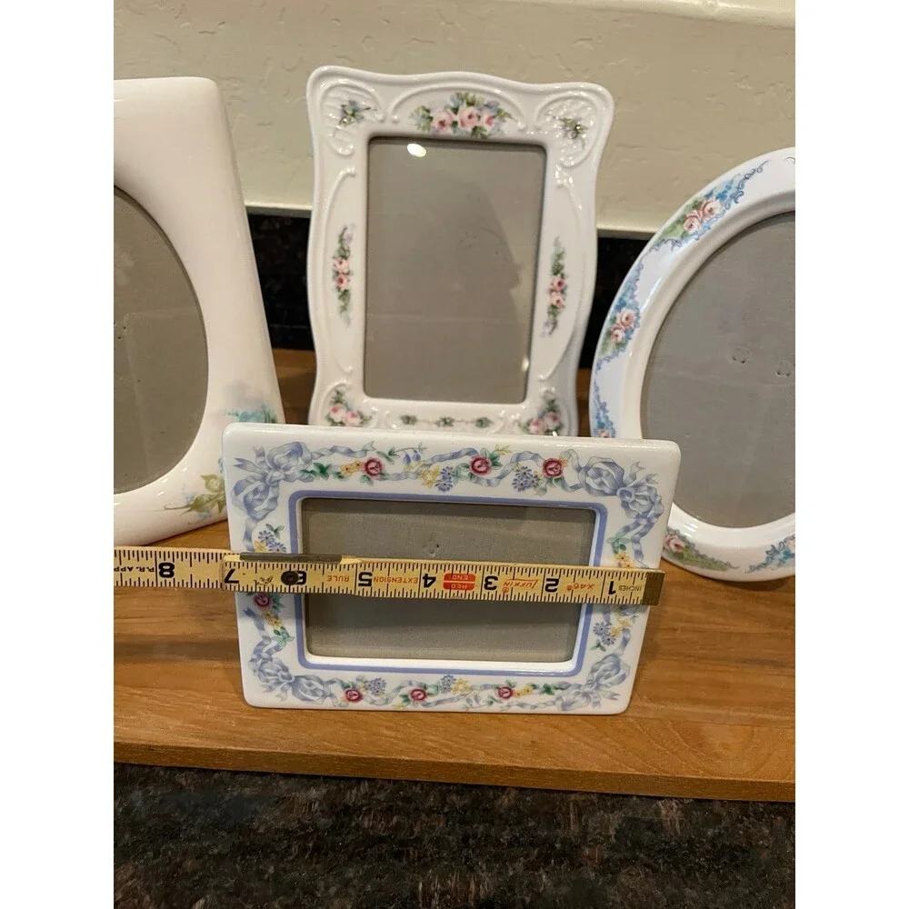 4 vintage floral ceramic photo frames
